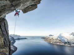 Banff Mountain Film Festival Australia: Mountains of Adventure climber dangling from an over hang credit Banff Film Festival