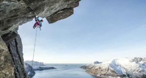 Banff Mountain Film Festival Australia: Mountains of Adventure climber dangling from an over hang credit Banff Film Festival